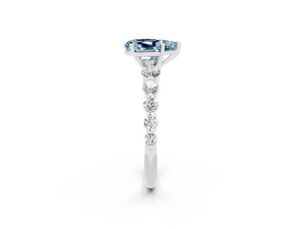 Platinum Pear Cut Solitaire Aquamarine Ring with Pave Band and Four-Prong Setting