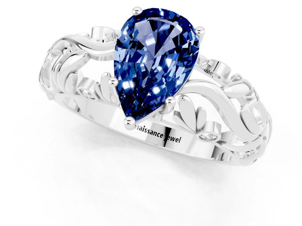 Platinum Pear Cut Solitaire Blue Sapphire Leaf-Inspired Vine Band Ring with Prong Setting