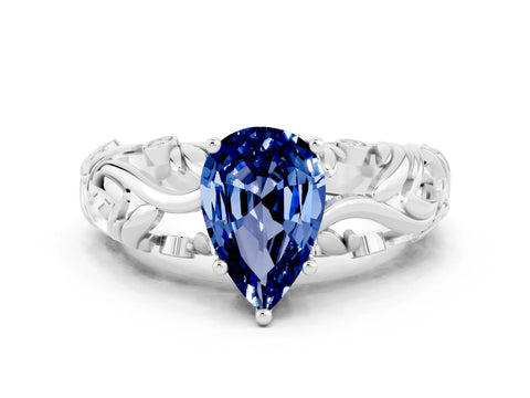 White gold Pear Cut Solitaire Blue Sapphire Leaf-Inspired Vine Band Ring with Prong Setting