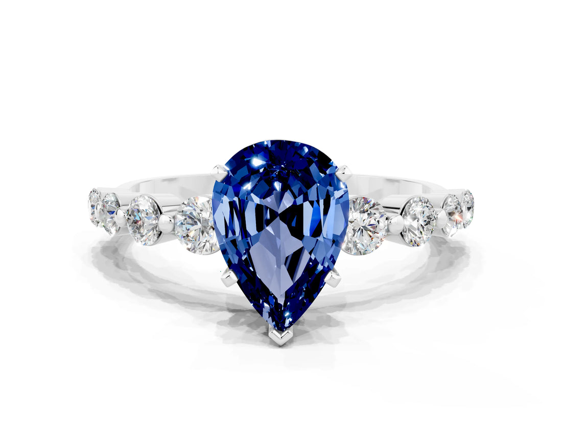 White gold Pear Cut Solitaire Blue Sapphire Ring with Pave Band and Four-Prong Setting
