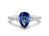 White gold Pear Cut Solitaire Blue Sapphire Ring with Pave Band and Four-Prong Setting