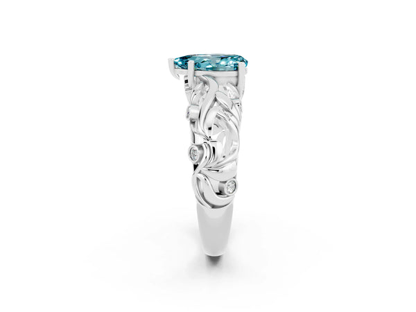 White gold Pear Cut Solitaire Blue Topaz Leaf-Inspired Vine Band Ring with Prong Setting