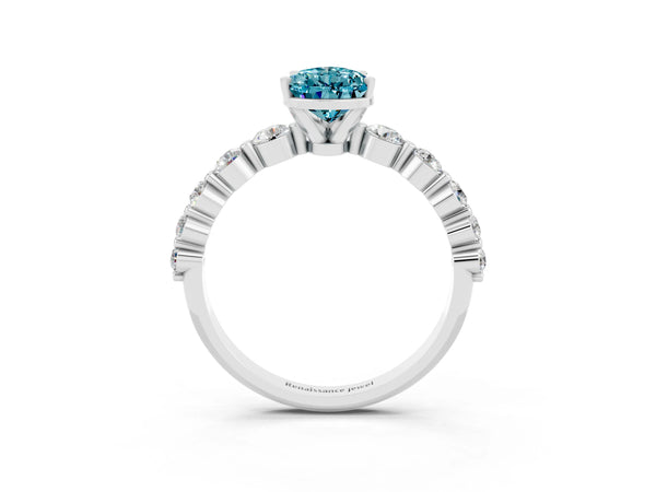 Platinum Pear Cut Solitaire Blue Topaz Ring with Pave Band and Four-Prong Setting