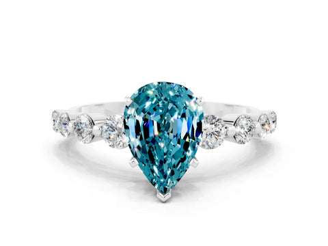 White gold Pear Cut Solitaire Blue Topaz Ring with Pave Band and Four-Prong Setting