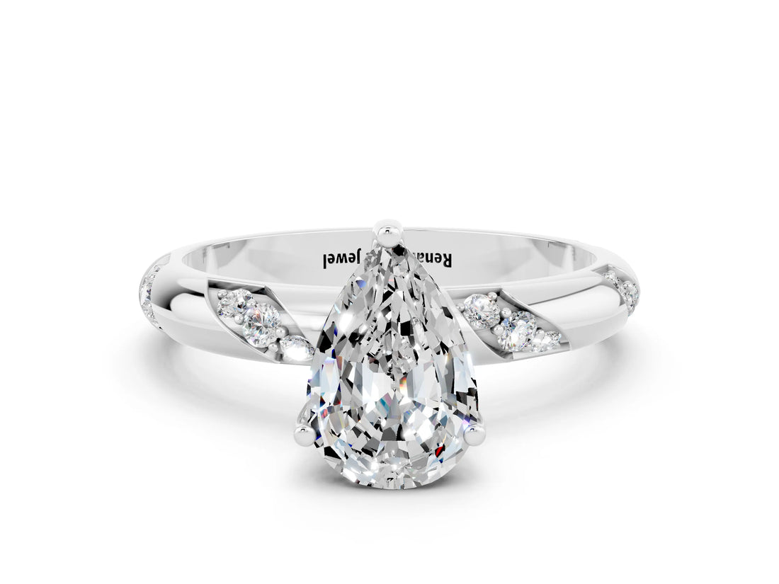 White gold Pear Cut Solitaire Diamond Engagement Ring with Twisted Pave Band and Four-Prong Setting