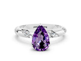 White gold Pear Cut Solitaire Diamond Engagement Ring with Twisted Pave Band and Four-Prong Setting