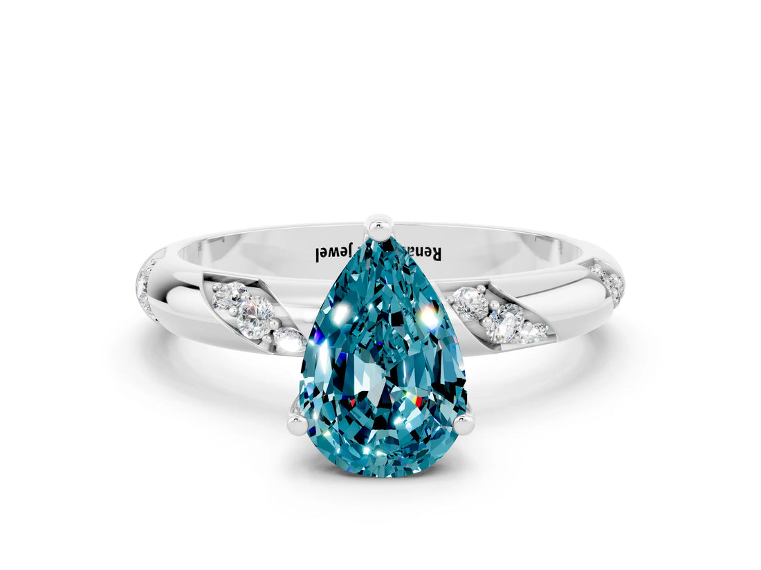 White gold Pear Cut Solitaire Diamond Engagement Ring with Twisted Pave Band and Four-Prong Setting