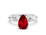 White gold Pear Cut Solitaire Diamond Engagement Ring with Twisted Pave Band and Four-Prong Setting