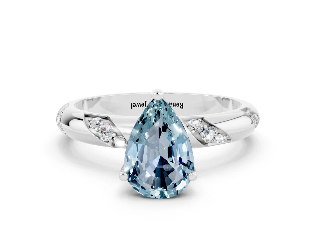 White gold Pear Cut Solitaire Diamond Engagement Ring with Twisted Pave Band and Four-Prong Setting