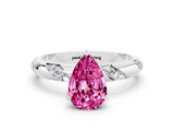 White gold Pear Cut Solitaire Diamond Engagement Ring with Twisted Pave Band and Four-Prong Setting