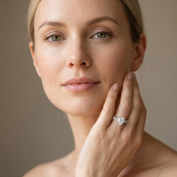 White gold Pear Cut Solitaire Diamond Twisted Band with Pave Setting