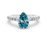 White gold Pear Cut Solitaire Diamond with Pavé Band and Four-Prong Setting