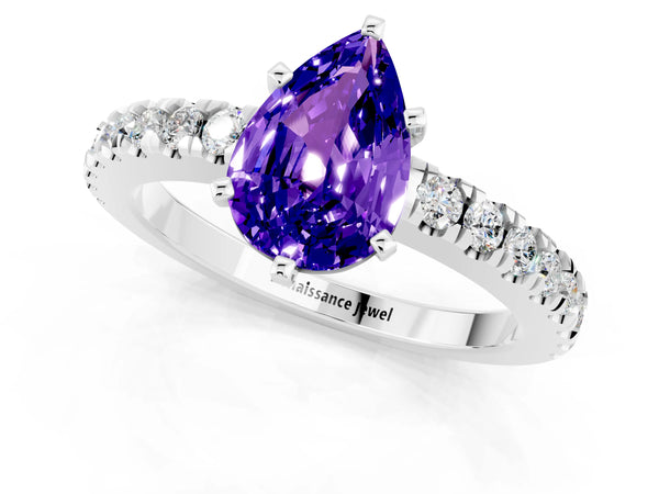 Platinum Pear Cut Solitaire Tanzanite with Pavé Band and Four-Prong Setting