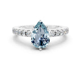 White gold Pear Cut Solitaire Diamond with Pavé Band and Four-Prong Setting