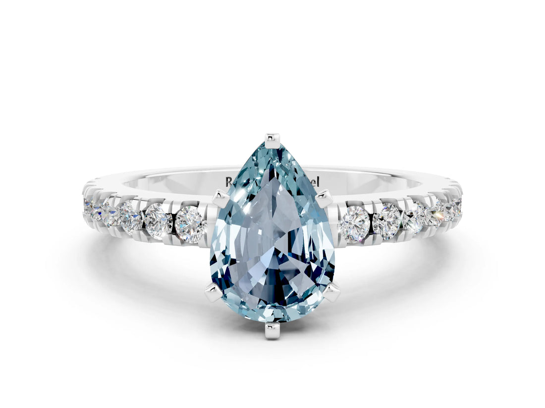 White gold Pear Cut Solitaire Diamond with Pavé Band and Four-Prong Setting