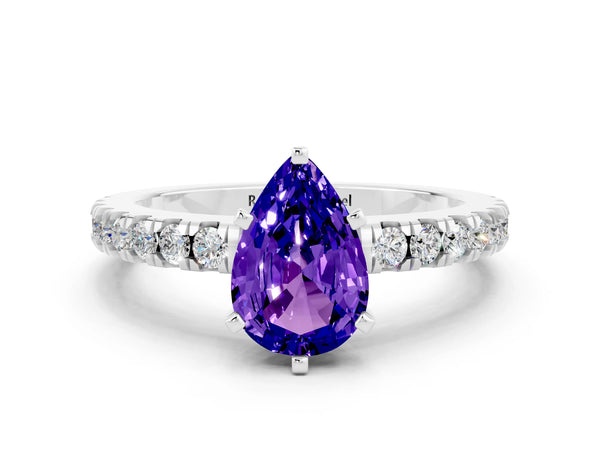 Platinum Pear Cut Solitaire Tanzanite with Pavé Band and Four-Prong Setting