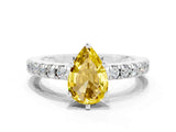 White gold Pear Cut Solitaire Diamond with Pavé Band and Four-Prong Setting