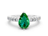 White gold Pear Cut Solitaire Diamond with Pavé Band and Four-Prong Setting