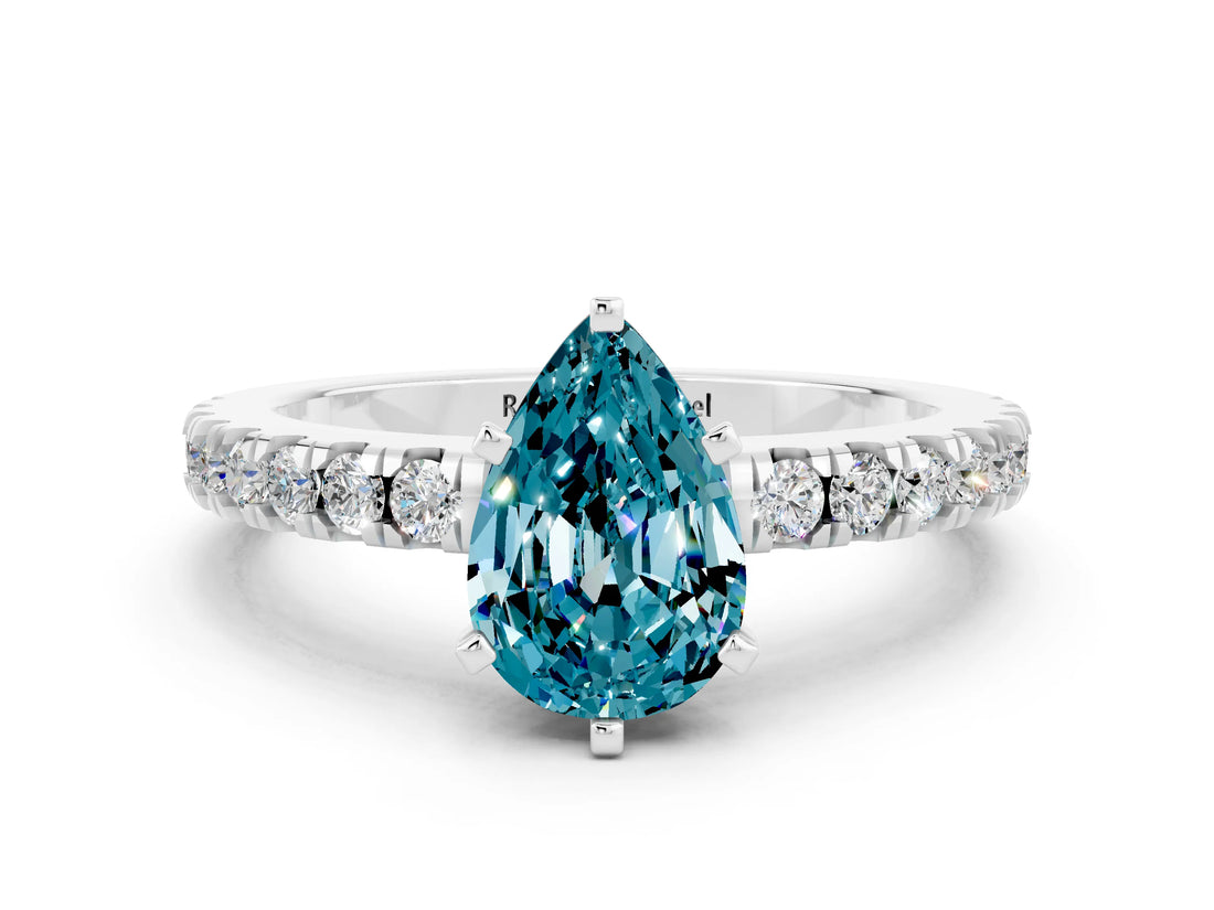 White gold Pear Cut Solitaire Diamond with Pavé Band and Four-Prong Setting