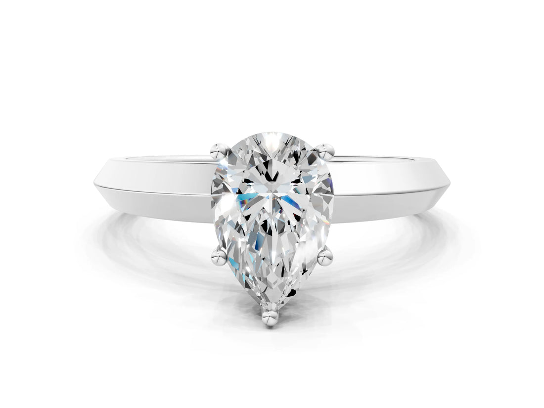 White gold Pear Cut Solitaire Engagement Ring with Flat Band and Four-Prong Setting