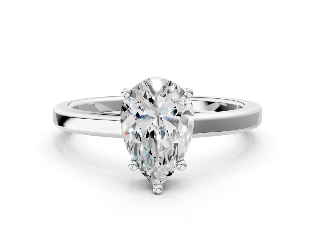 White gold Pear Cut Solitaire Engagement Ring with Four-Prong Setting on a Classic Band_57