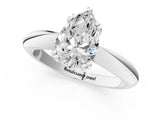 White gold Pear Cut Solitaire Engagement Ring with Tapered Band and Four-Prong Setting 1