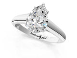 White gold Pear Cut Solitaire Engagement Ring with Tapered Band and Four-Prong Setting_4