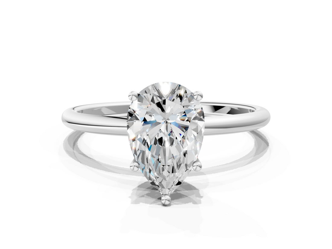 White gold Pear Cut Solitaire Engagement Ring with Thin Band and Four-Prong Setting_3