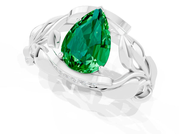 White gold Pear Cut Emerald Leaf-Inspired Engagement Ring with Round Accents and Prong Setting