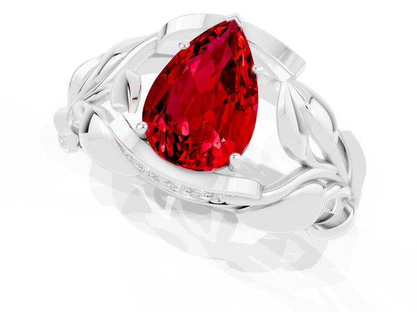 Silver Pear Cut Ruby Leaf-Inspired Engagement Ring with Round Accents and Prong Setting