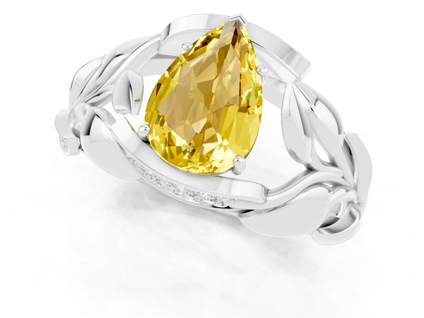White gold Pear Cut Yellow Sapphire Leaf-Inspired Engagement Ring with Round Accents and Prong Setting