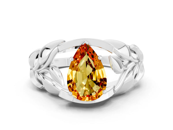 Platinum Pear Cut Citrine Leaf-Inspired Engagement Ring with Round Accents and Prong Setting
