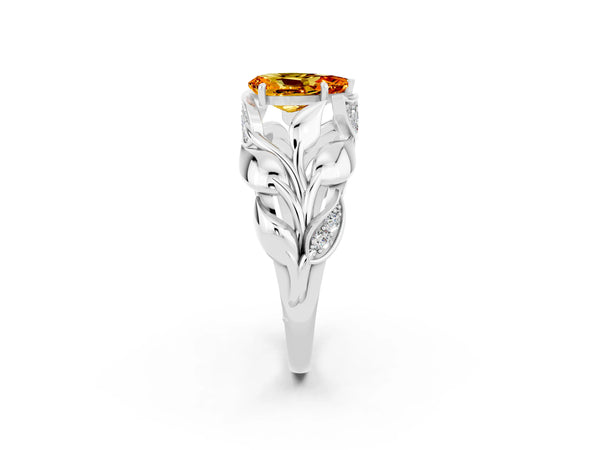 Platinum Pear Cut Citrine Leaf-Inspired Engagement Ring with Round Accents and Prong Setting