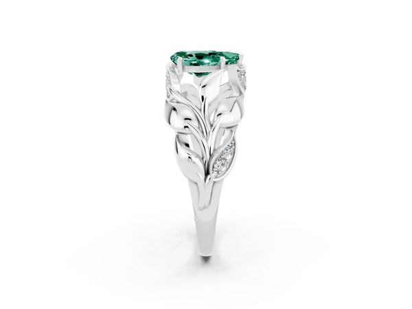 White gold Pear Cut Green Sapphire Leaf-Inspired Engagement Ring with Round Accents and Prong Setting
