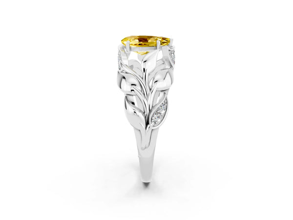 White gold Pear Cut Yellow Sapphire Leaf-Inspired Engagement Ring with Round Accents and Prong Setting