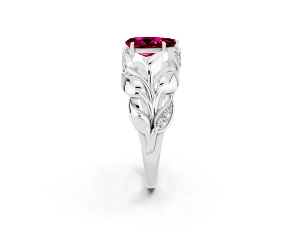 White gold Pear Cut Garnet Leaf-Inspired Engagement Ring with Round Accents and Prong Setting