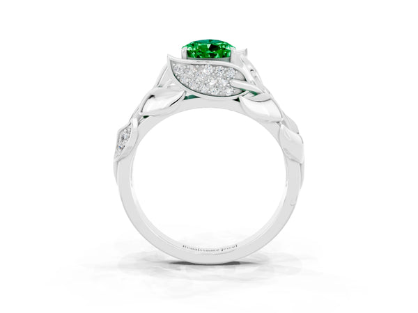 White gold Pear Cut Emerald Leaf-Inspired Engagement Ring with Round Accents and Prong Setting