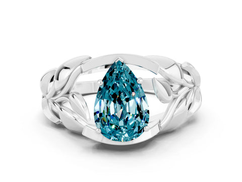 White gold Pear Cut Solitaire Leaf-Inspired Engagement Ring with Prong Setting