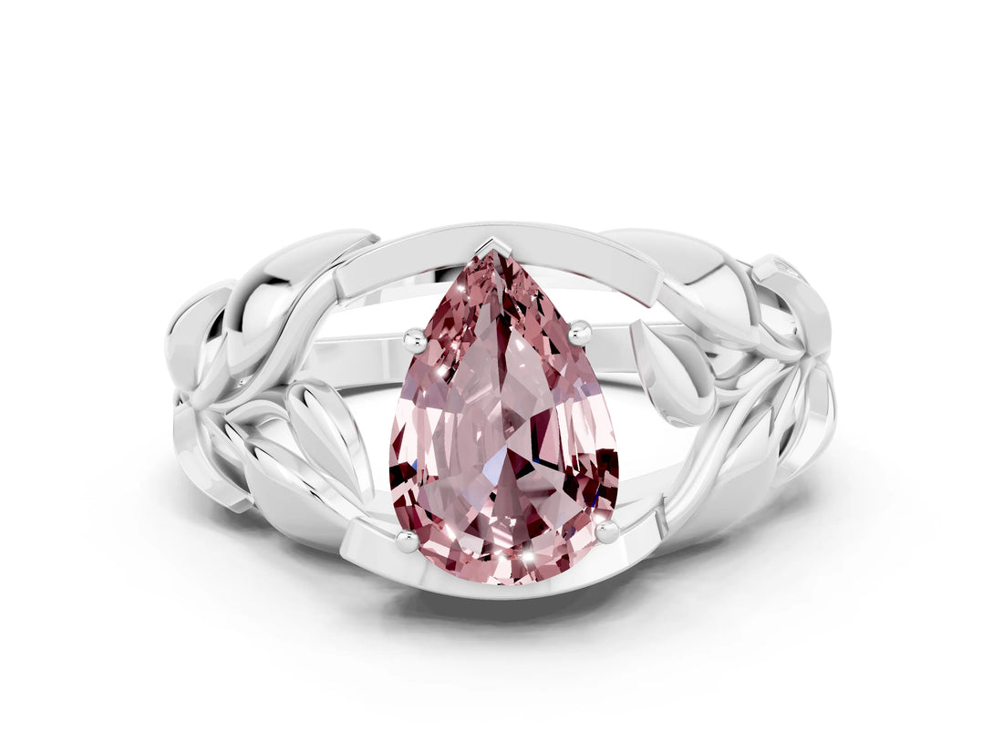 White gold Pear Cut Solitaire Leaf-Inspired Engagement Ring with Prong Setting