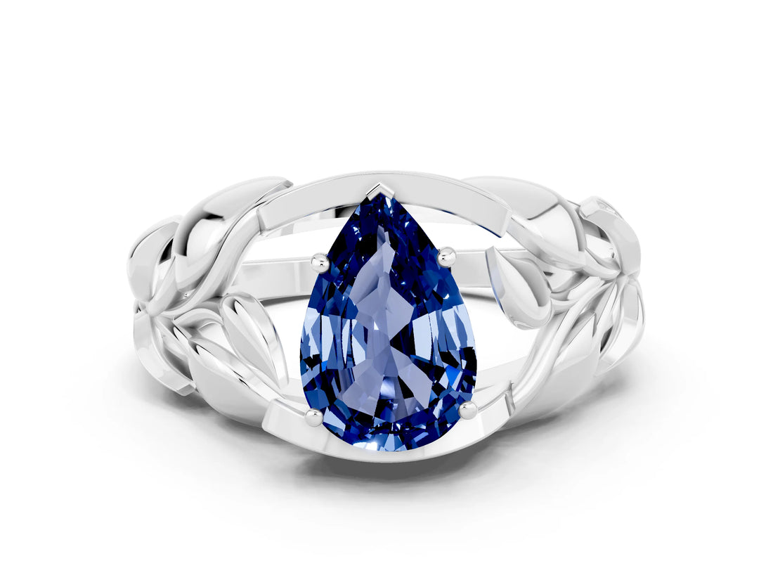 White gold Pear Cut Solitaire Leaf-Inspired Engagement Ring with Prong Setting