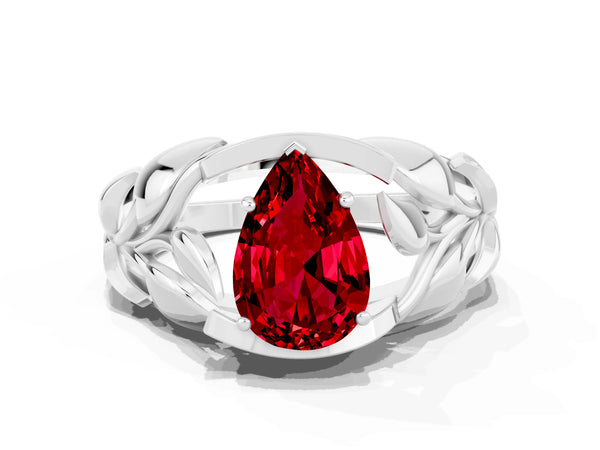 Platinum Pear Cut Ruby Leaf-Inspired Engagement Ring with Round Accents and Prong Setting