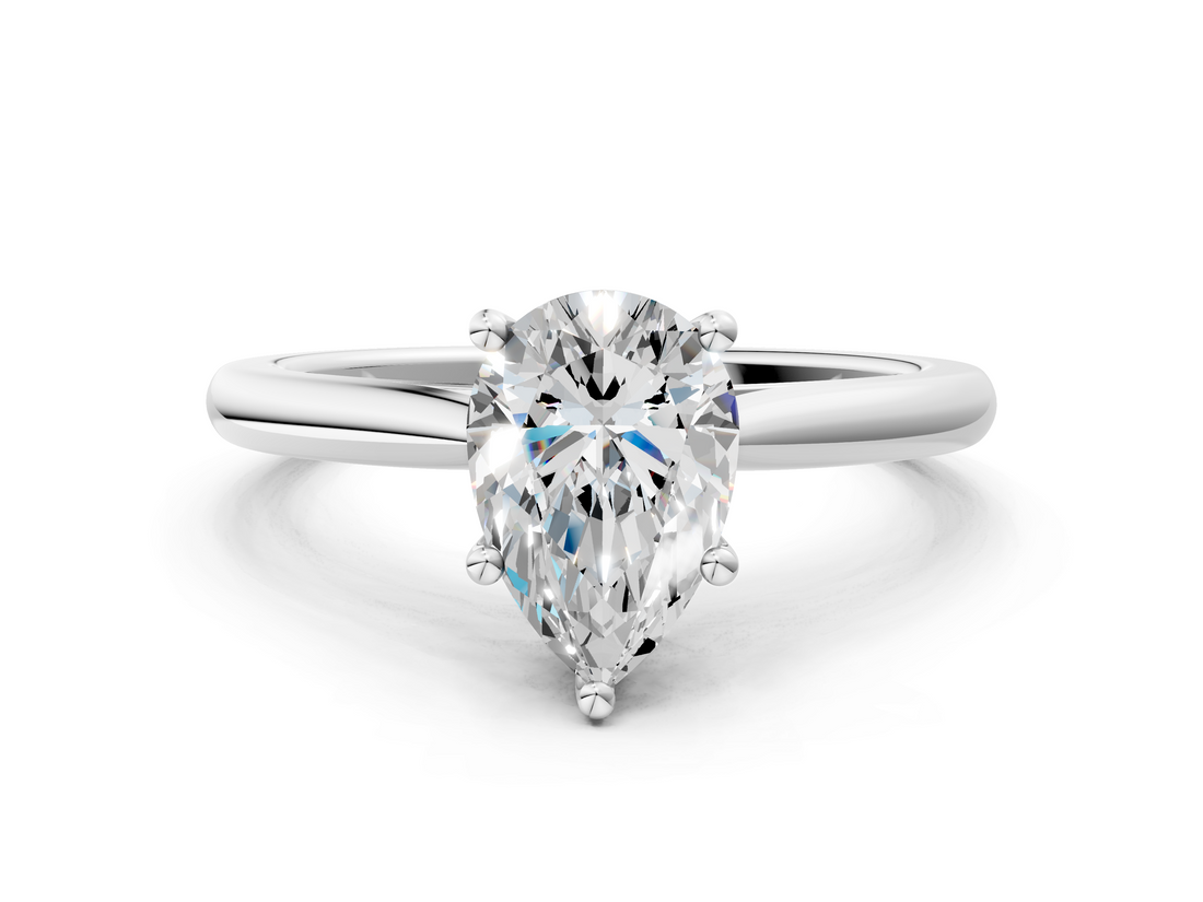 White gold Pear Cut Solitaire Ring with Cathedral Band and Four-Prong Setting_109
