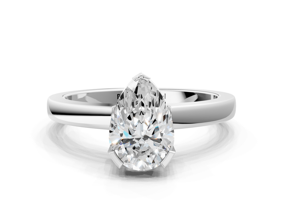 White gold Pear Cut Solitaire Ring with Four-Prong Setting and Classic Band_123