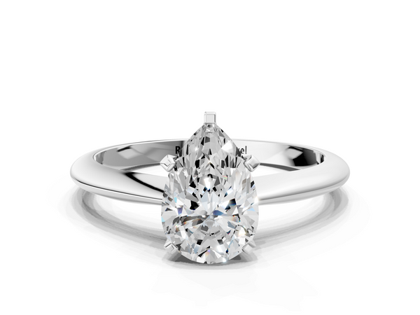 White gold Pear Cut Solitaire Ring with Four-Prong Setting on a Classic Band