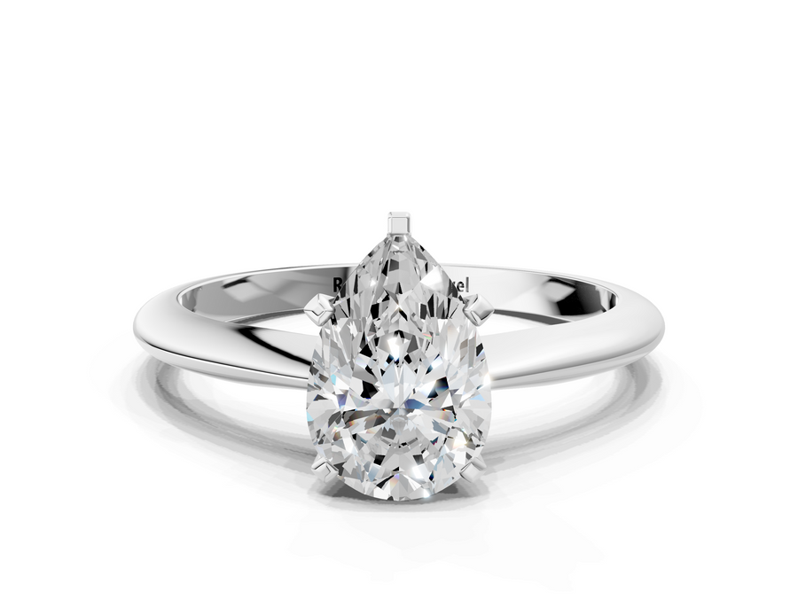 White gold Pear Cut Solitaire Ring with Four-Prong Setting on a Classic Band