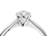 White gold Pear Cut Solitaire Ring with Four-Prong Setting on a Classic Band_110