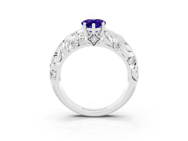 Silver Pear Cut Solitaire Tanzanite Leaf-Inspired Vine Band Ring with Prong Setting