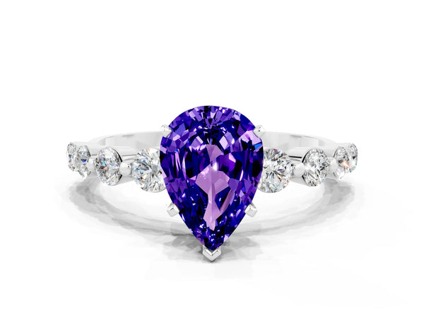 Platinum Pear Cut Solitaire Tanzanite Ring with Pave Band and Four-Prong Setting