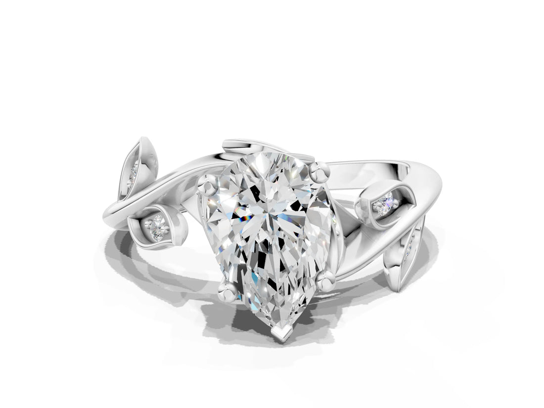 White gold Pear Cut Solitaire Twist Engagement Ring with Leaf Accents and Prong Setting_19