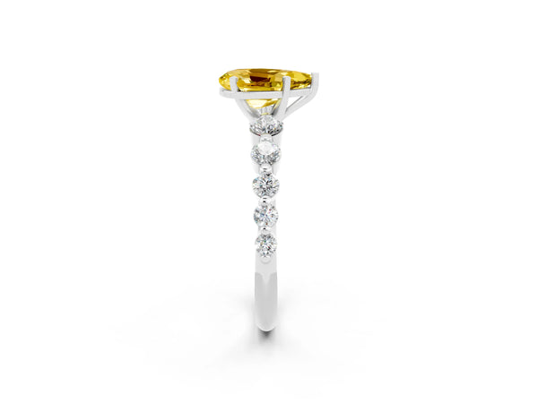 Platinum Pear Cut Solitaire Yellow Sapphire Ring with Pave Band and Four-Prong Setting